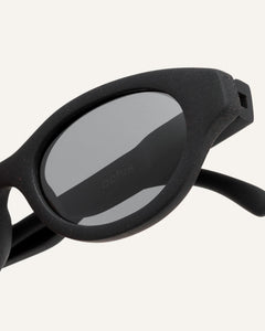 gray oval-shaped glasses